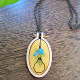 yellow lightbulb embroidered wood necklace