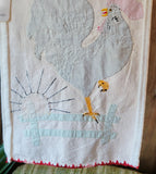 Back of Vintage rooster wall hanging